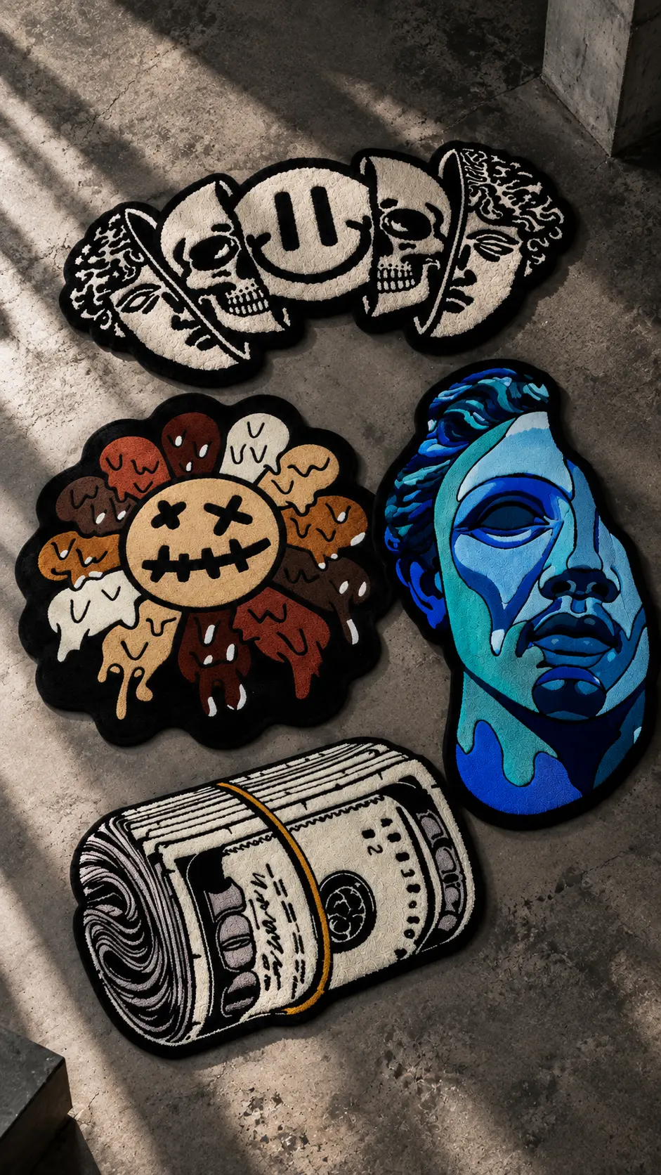 Art and culture rugs including skull, flower face, blue portrait and money roll designs on concrete